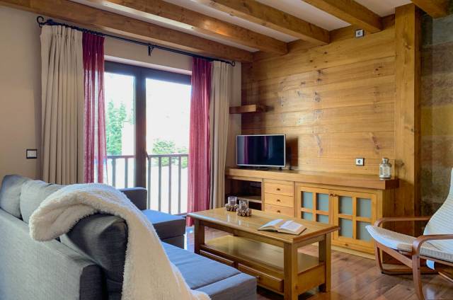 T1 com 1 quarto com cama de casal e 1 sofá-cama na sala