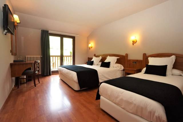 Quarto triplo com varanda